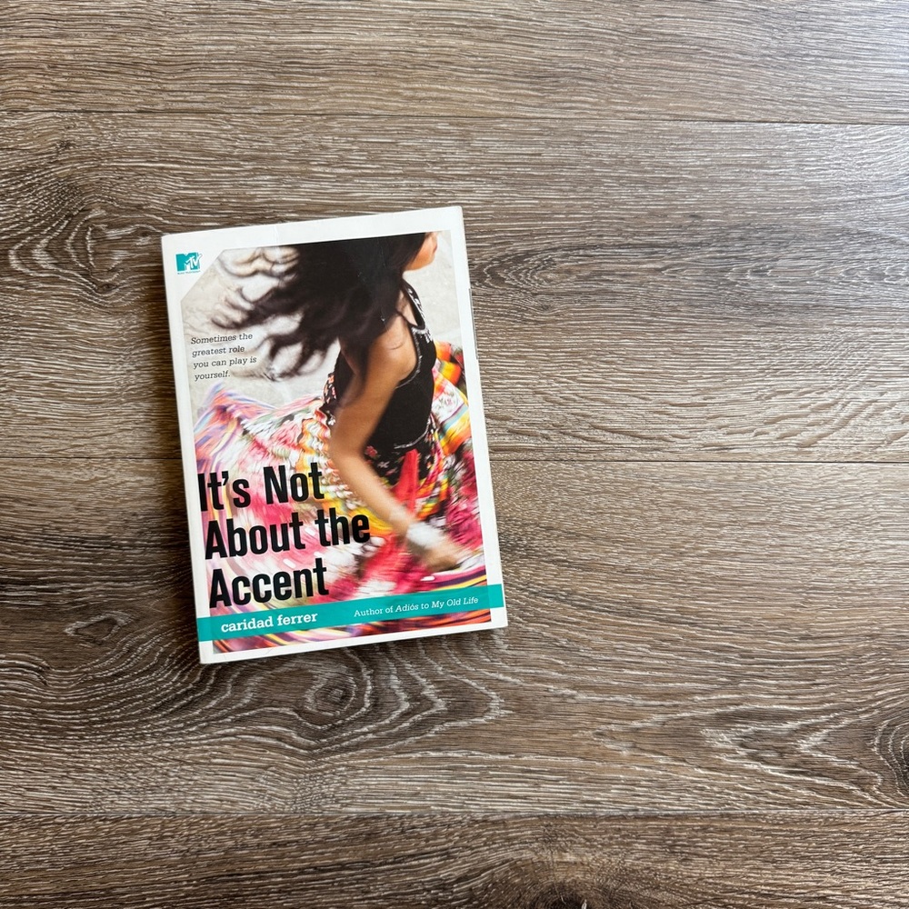 It's Not About the Accent by Caridad Ferrer, Paperback Book